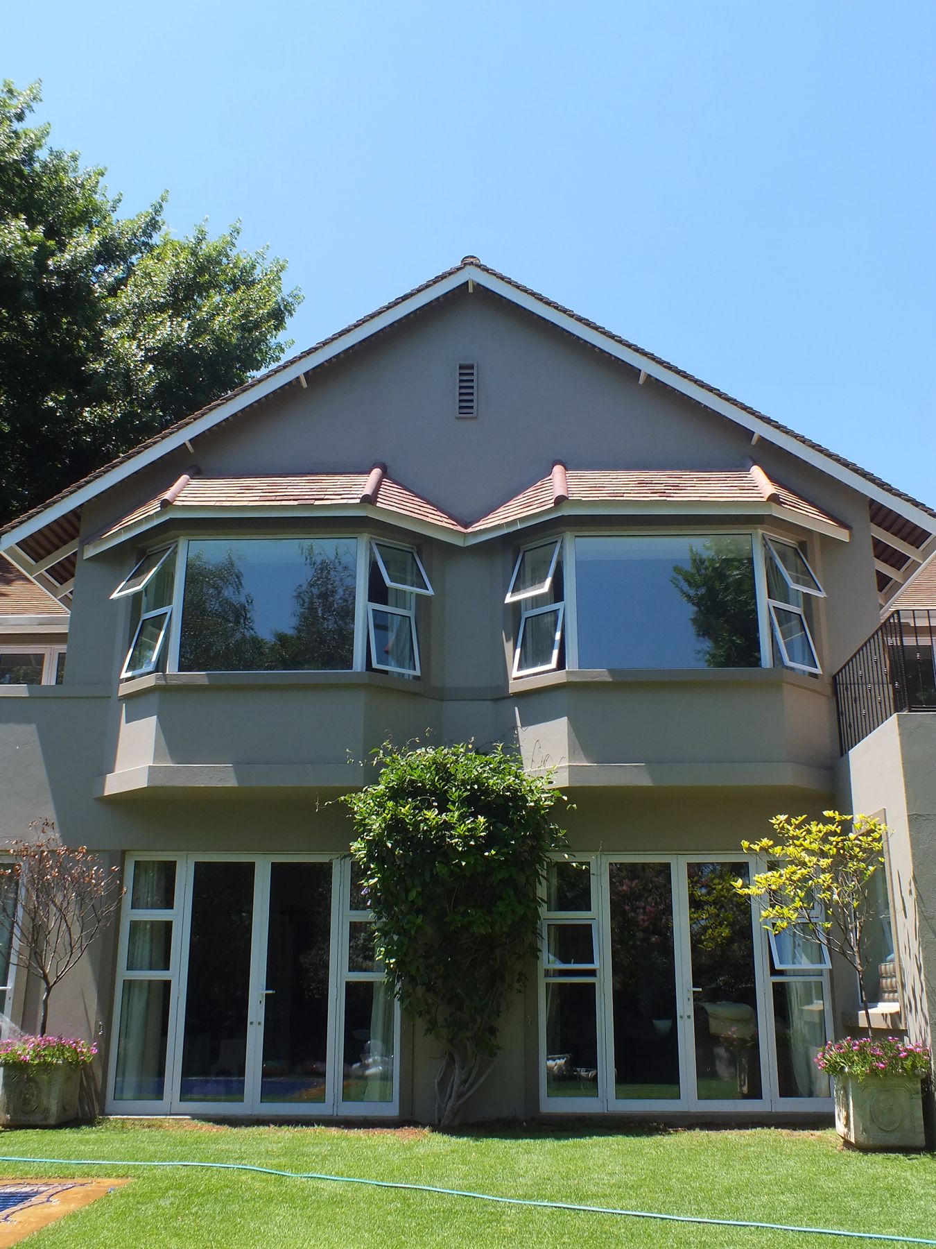 New bay windows under the garden gable — House in Atholl