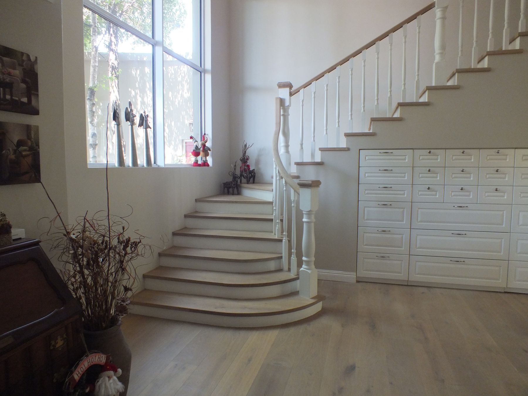 Entrance hall stair with joinery below — House in Atholl