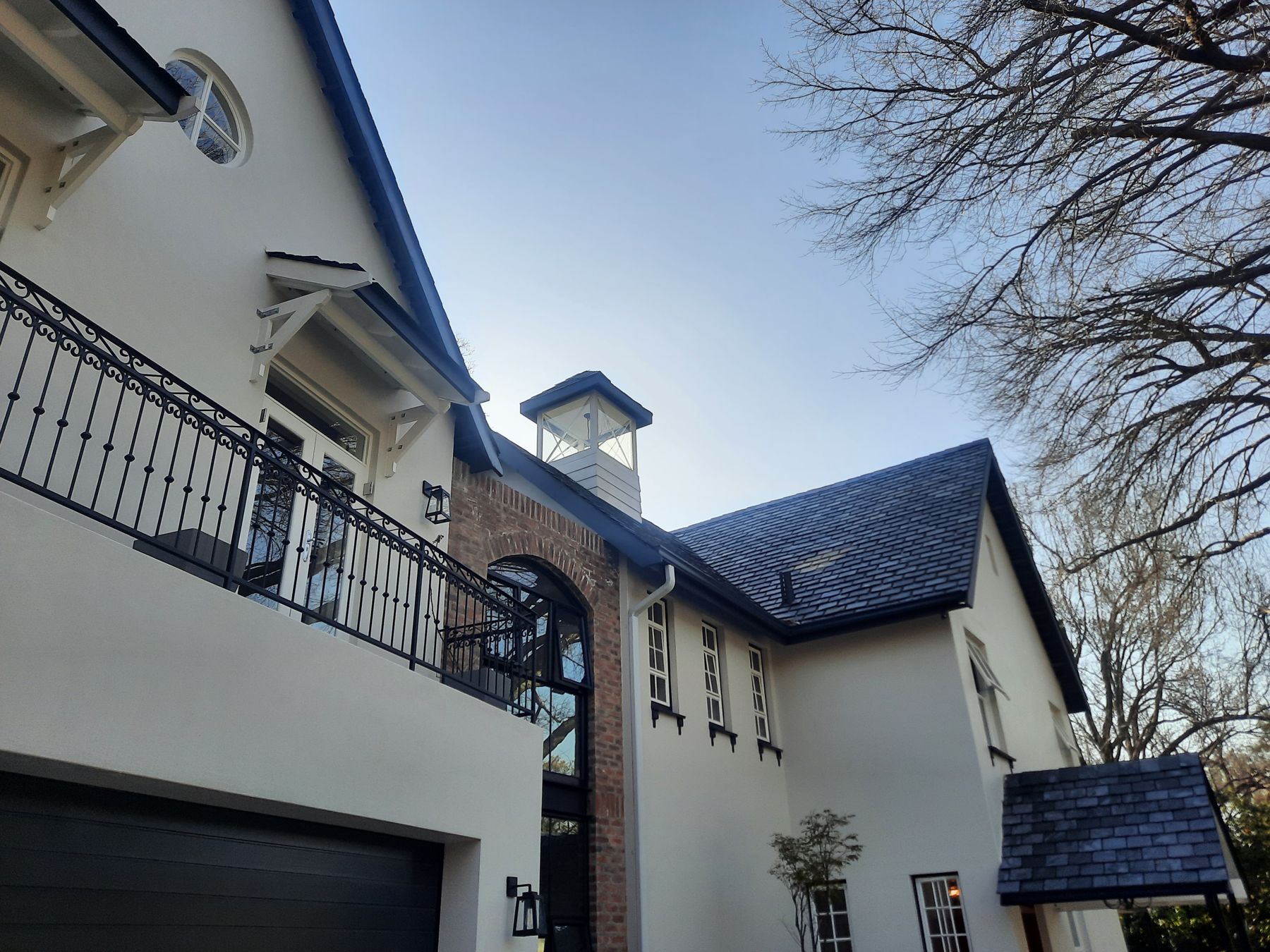 Balcony and cupola above the garage court — Heritage house in Melrose