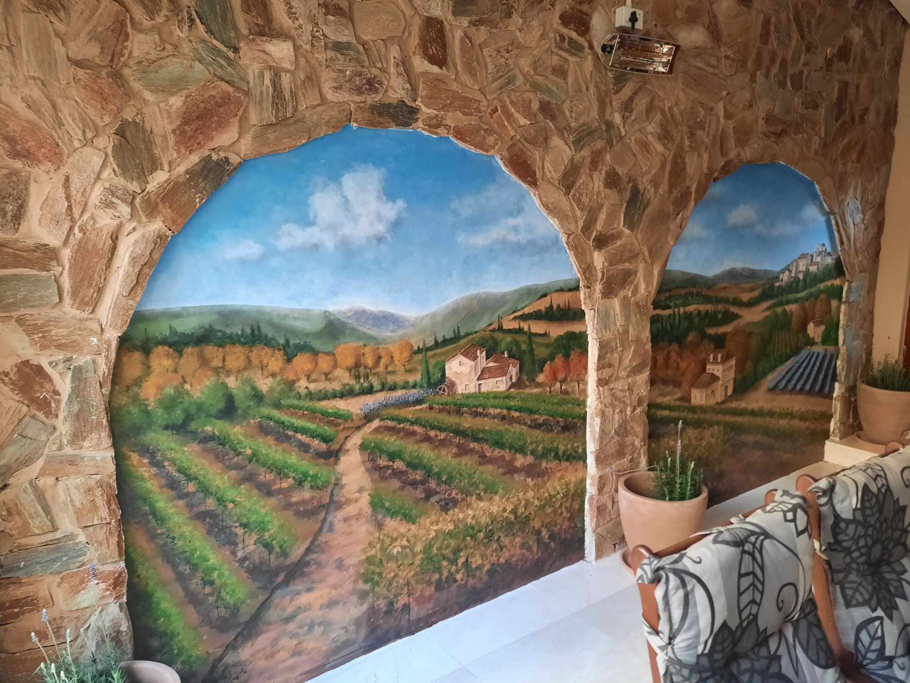 The painted landscape against the real stone — Wall mural in Bryanston